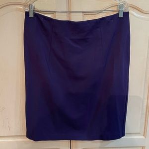 A grape colored pencil skirt.  It is a beautiful grape/ plum color. Size 10!